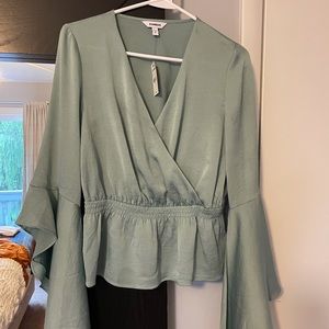 Express top with bell sleeves
